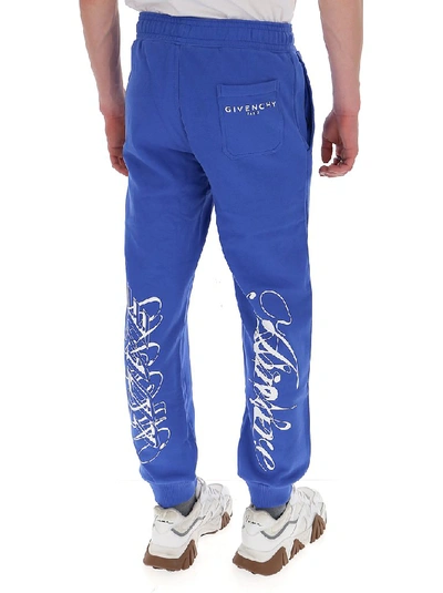 Shop Givenchy Printed Sweatpants In Blue