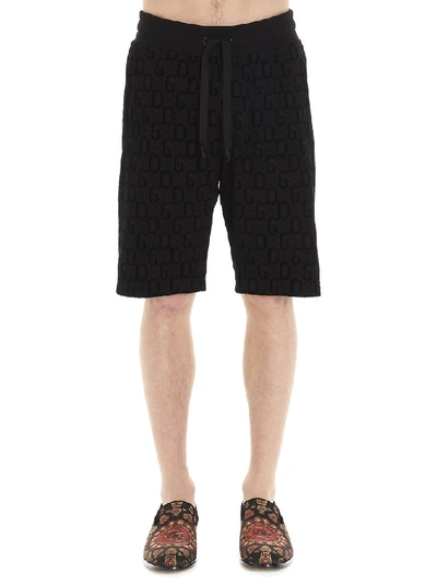 Shop Dolce & Gabbana All Over Logo Bermuda Shorts In Black