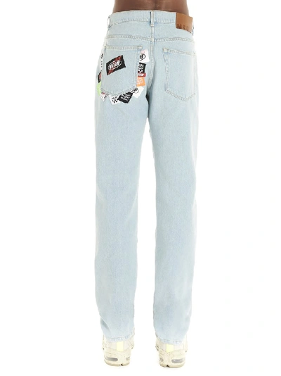 Shop Msgm Patch Detail Jeans In Blue
