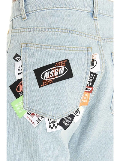 Shop Msgm Patch Detail Jeans In Blue