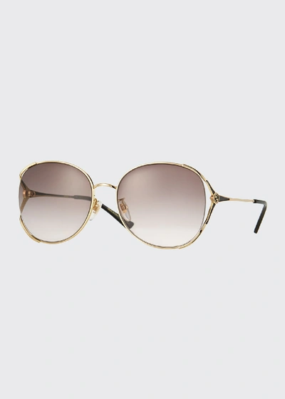 Shop Gucci Round Metal Sunglasses In Black/gold