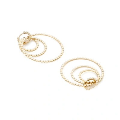 Shop Nancy Newberg Daisy Triple Hoop Earrings In Yellow Gold