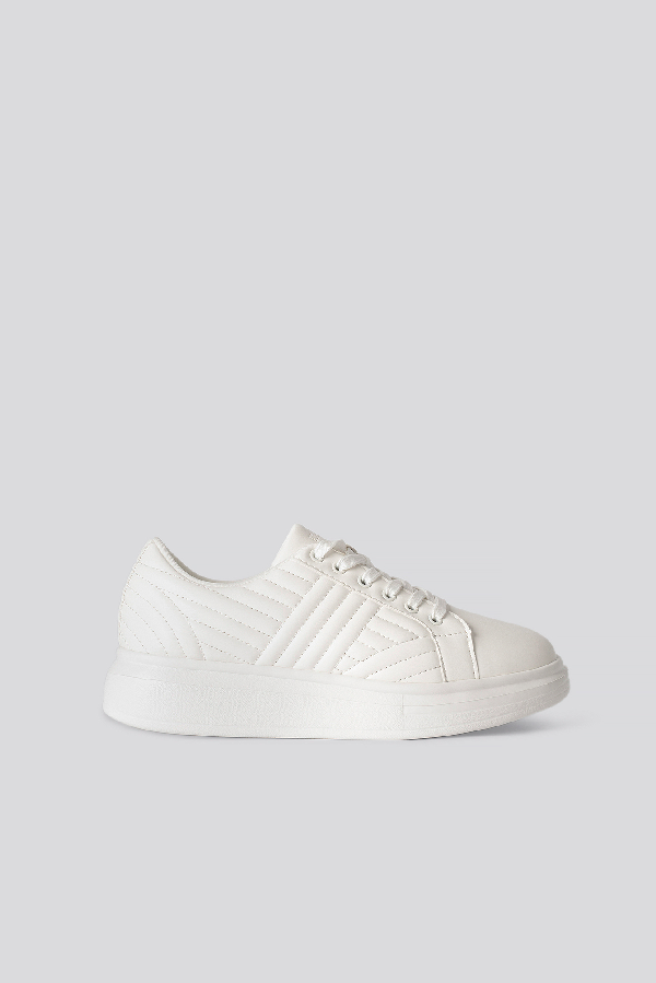 white quilted sneakers