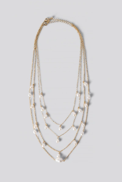 Shop Na-kd Layered Uneven Pearl Necklace In Gold