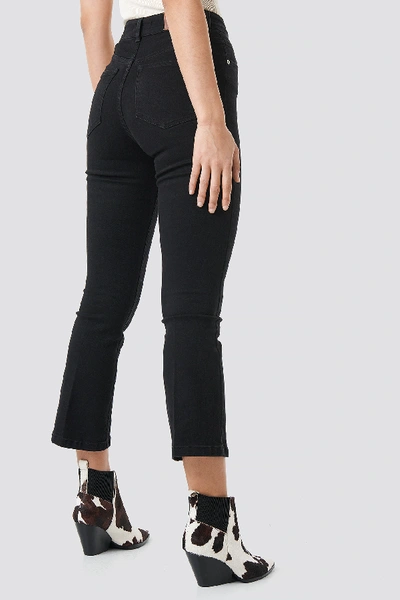 Shop Na-kd Mid Rise Cropped Flared Jeans - Black
