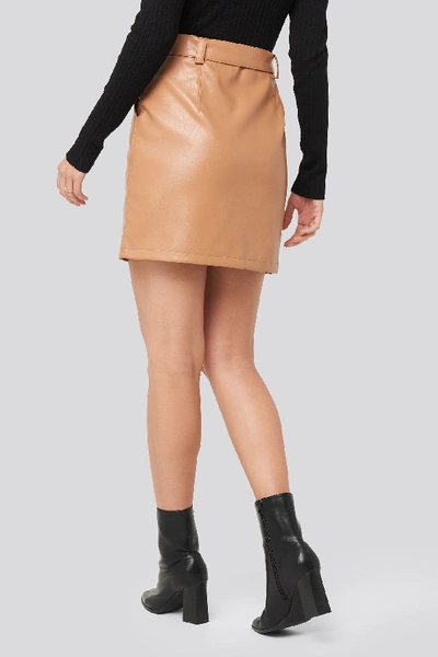 Shop Adorable Caro X Na-kd Pu Button Detail Skirt - Brown In Tan