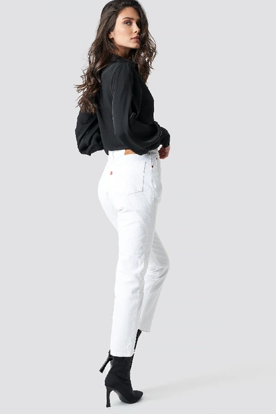Shop Levi's 501 Crop Jeans - White In Neutral