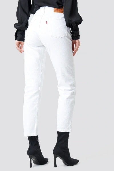 Shop Levi's 501 Crop Jeans - White In Neutral