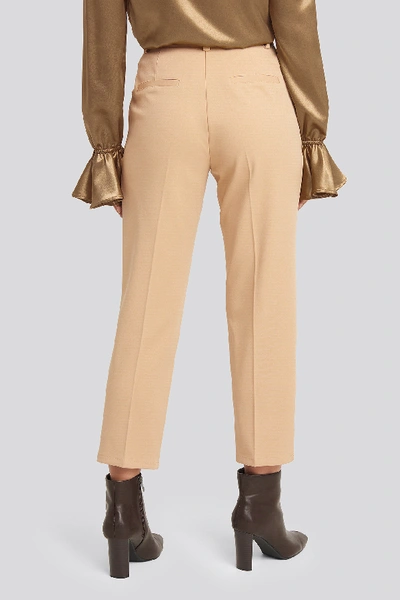 Shop Afj X Na-kd Creased Suit Trousers Beige In Light Beige