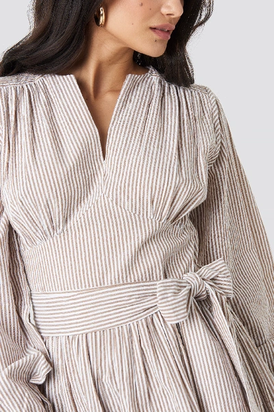 Shop Na-kd Cup Detail Tie Waist Dress - Beige In Stripe