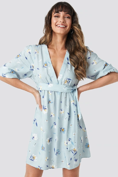 Shop Na-kd Deep V Mini Dress - Blue In Floral Print