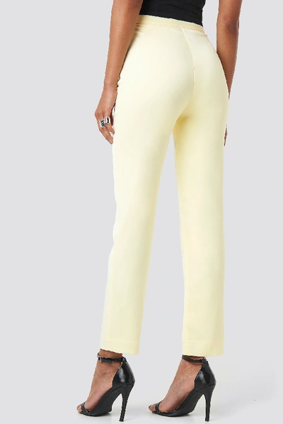 Shop Anna Nooshin X Na-kd Tailored Ankle Suiting Pants - Yellow In Light Yellow