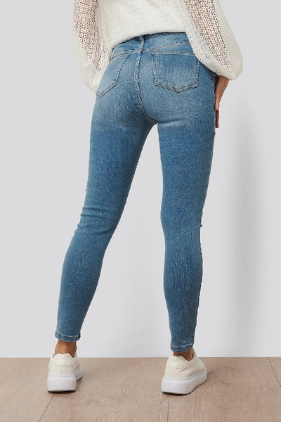 Shop Anika Teller X Na-kd Slim Fit Destroyed Jeans - Blue In Mid Blue