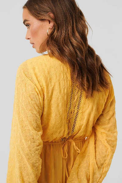 Shop Na-kd Lace-up Back Mini Dress - Yellow In Light Yellow