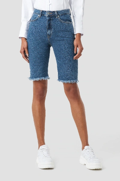 Shop Anna Nooshin X Na-kd Highwaisted Raw Hem Denim Shorts - Blue In Mid Blue