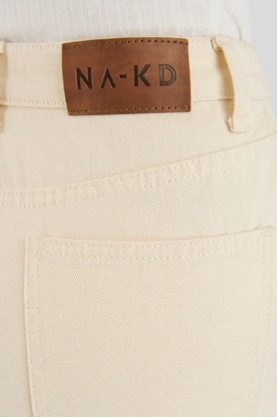 Shop Na-kd Mid Rise Pocket Denim - Beige In Cream