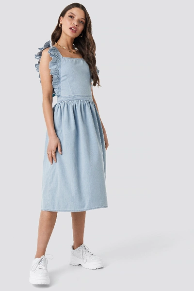 Shop Na-kd Ruffle Denim Pinafore Dress Blue In Mid Blue