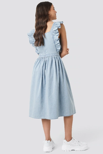 Shop Na-kd Ruffle Denim Pinafore Dress Blue In Mid Blue