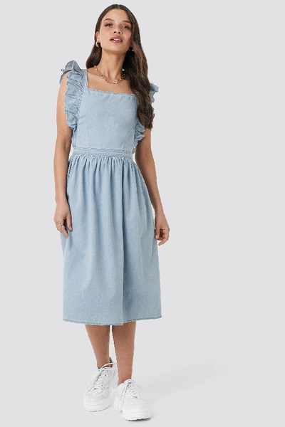 Shop Na-kd Ruffle Denim Pinafore Dress Blue In Mid Blue