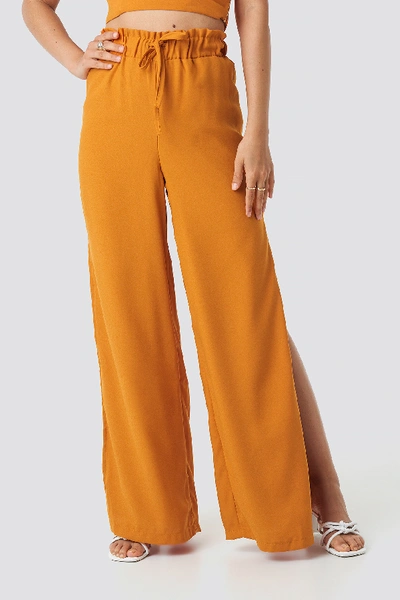 Shop Adorable Caro X Na-kd Side Slit Wide Pants - Orange