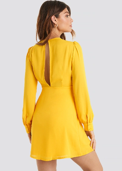 Shop Na-kd Open Back Flowy Mini Dress - Yellow In Citrus