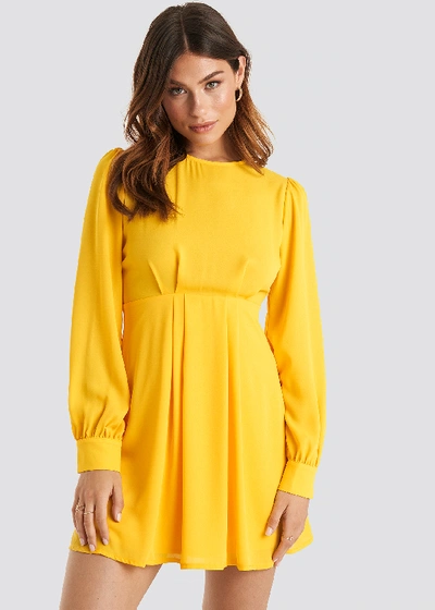 Shop Na-kd Open Back Flowy Mini Dress - Yellow In Citrus