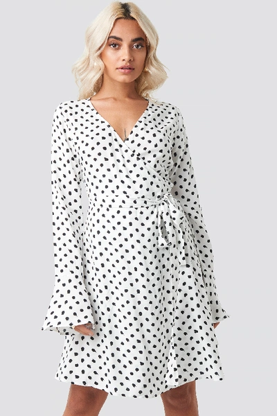 Shop Afj X Na-kd Dot Print Wrap Mini Dress - White In White/black