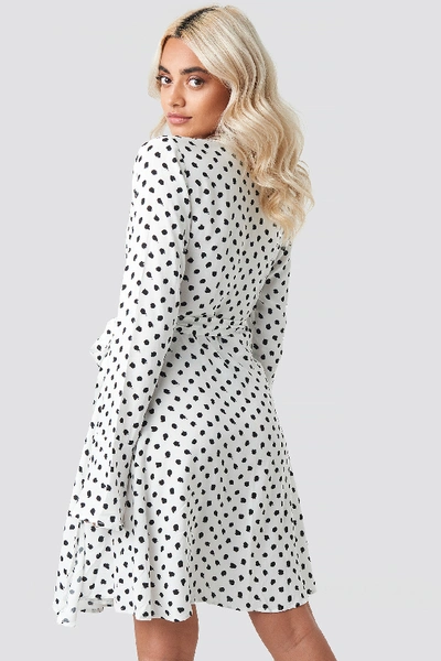 Shop Afj X Na-kd Dot Print Wrap Mini Dress - White In White/black