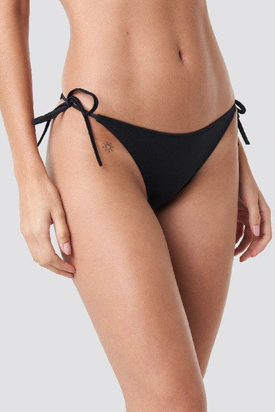 Shop Calvin Klein Cheeky String Side Tie Bikini - Black In Pvh Black