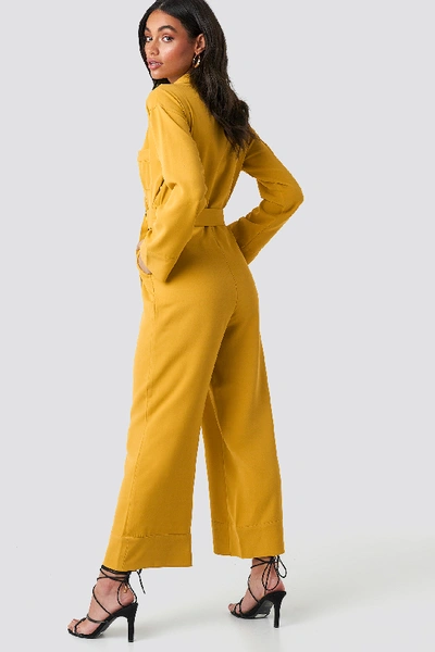 Shop Hoss X Na-kd Belted Wrap Front Jumpsuit - Yellow