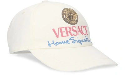 Shop Versace Logo Print Cap In Bianco Ottico