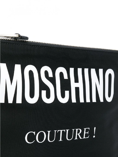 Shop Moschino Logo Clutch In Black