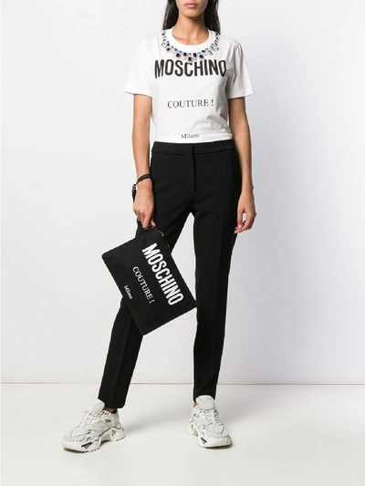Shop Moschino Logo Clutch In Black