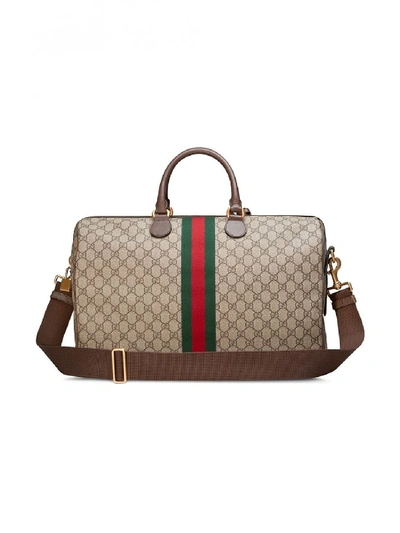 Shop Gucci Ophidia Gg Carry-on Duffle In Beige