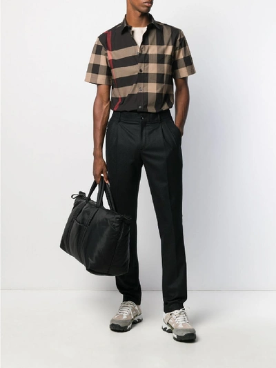 Shop Burberry Wool Chino Trousers In Black