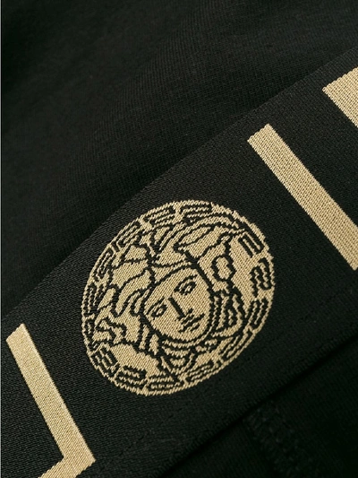 Shop Versace Low Slip With Logo In Black