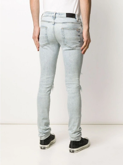 Shop Amiri Tie Dye Mx1 Jeans