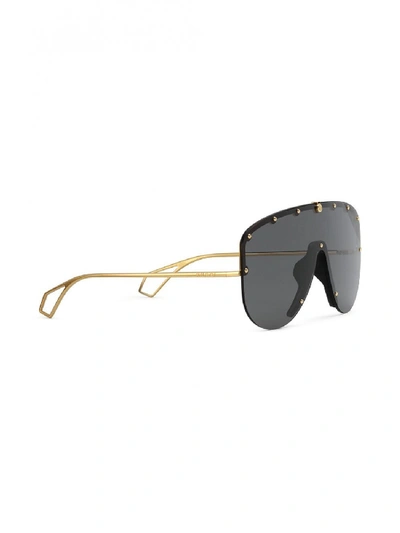 Shop Gucci Gg0667s Sunglasses In Gold
