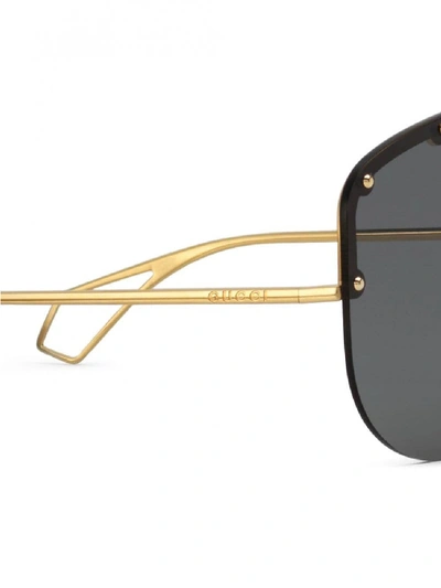 Shop Gucci Gg0667s Sunglasses In Gold