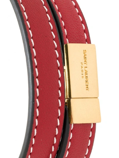 Shop Saint Laurent Opyum Leather Bracelet In Red