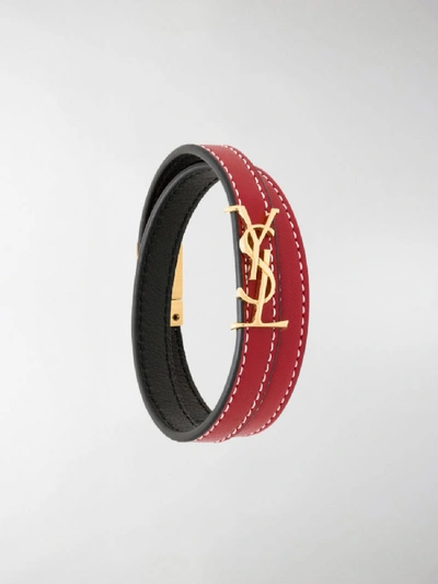 Shop Saint Laurent Opyum Leather Bracelet In Red