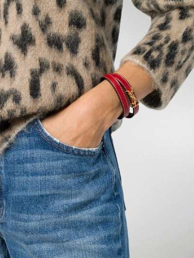 Shop Saint Laurent Opyum Leather Bracelet In Red