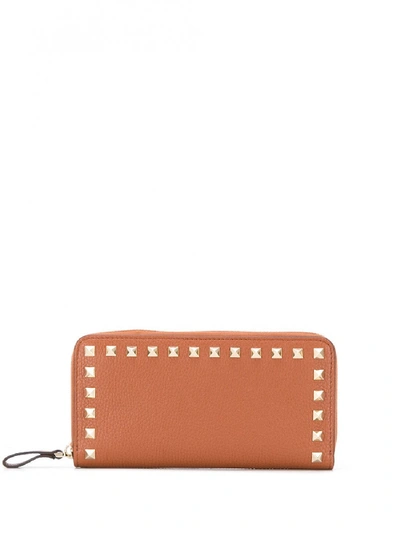 Shop Valentino Rockstud Leather Wallet In Brown