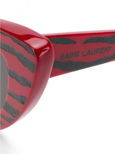 Shop Saint Laurent Zebra Print Sunglasses In Red