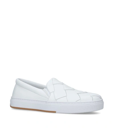 Shop Bottega Veneta Leather Woven Slip-on Sneakers