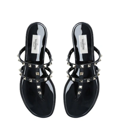Shop Valentino Rubber Rockstud Sandals In Black
