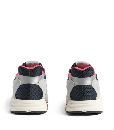 Shop Adidas Originals Zx Torsion Sneakers