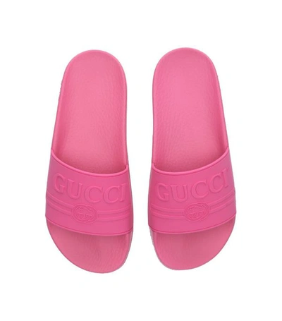 Shop Gucci Logo Pursuit Pool Slides