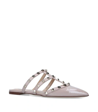 Shop Valentino Leather Rockstud Slippers