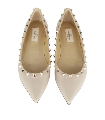 Shop Valentino Rockstud Flats In Nude